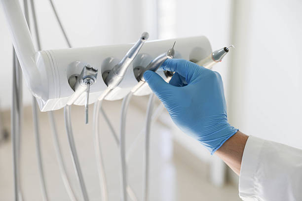 Professional Emergency Dentist technician working in McIntosh County County, OK